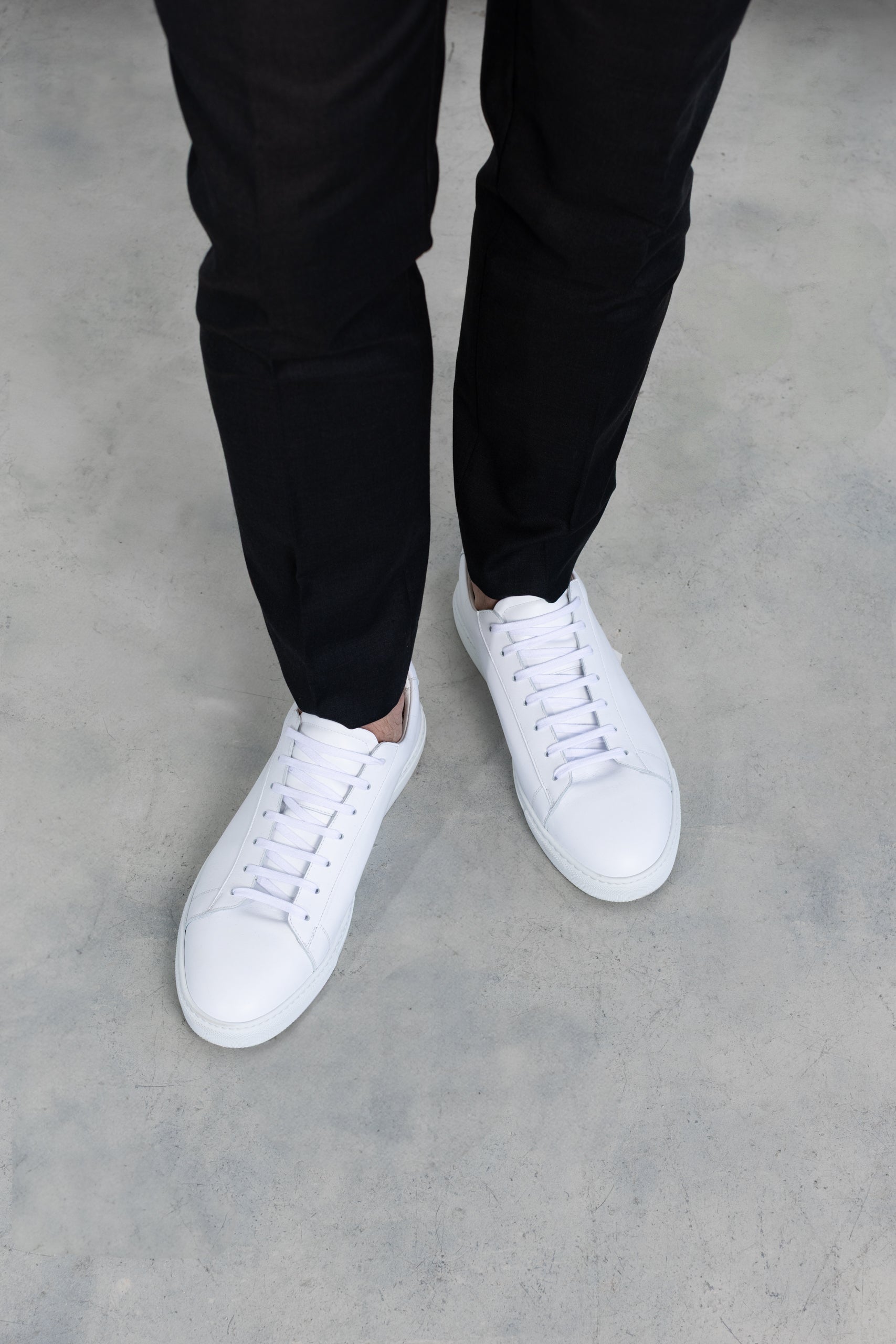 White Leather Sneakers with Subtle Cement Accents A must-have in your sneaker rotation ? The Air Jordan Retro  main image 3