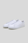 Three-quarter studio view of a pair of Olen Città low-top sneakers in white calfskin leather.