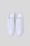 Top-down studio view of a pair of Olen Città low-top sneakers in white calfskin leather.