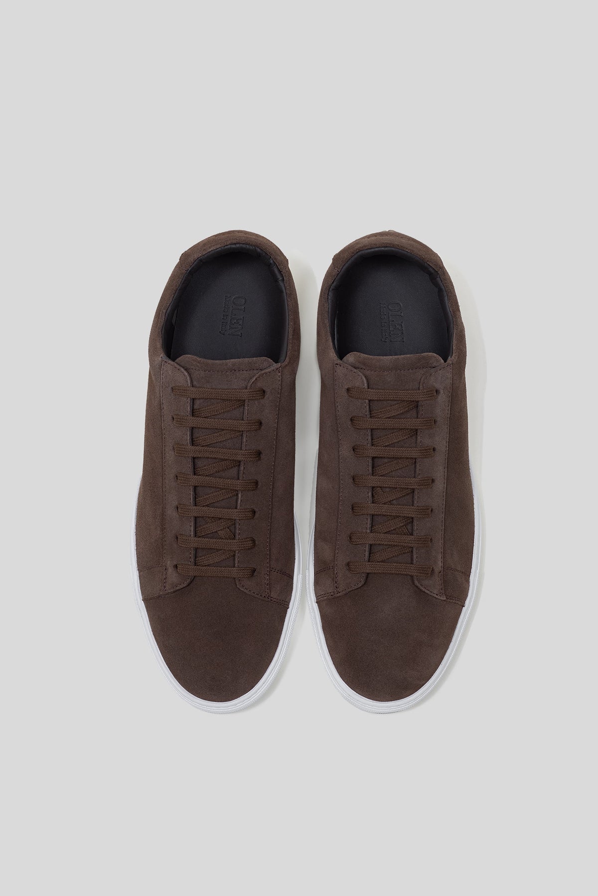 Top-down view of Olen dark brown suede Città sneakers with matching brown laces.